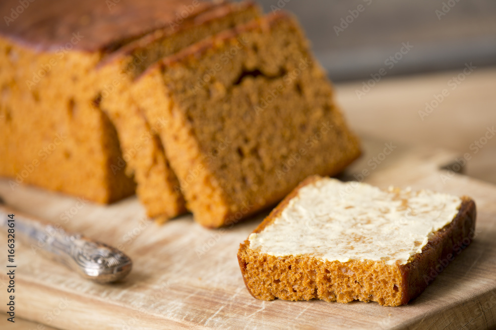 Traditional Dutch spice bread or 'ontbijtkoek' with butter