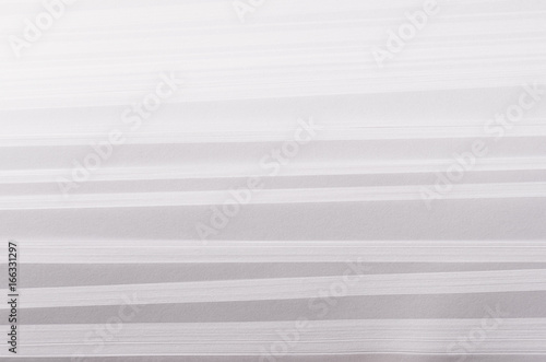 Striped stepped soft white and grey abstract paper texture with halftone perspective.