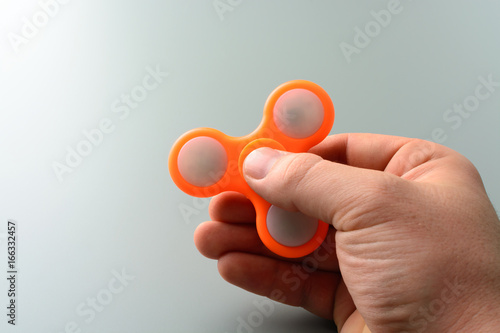 Person playing with spinner