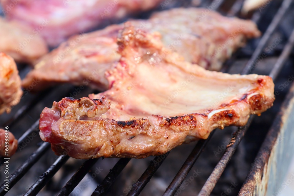 pork ribs on barbecue grill