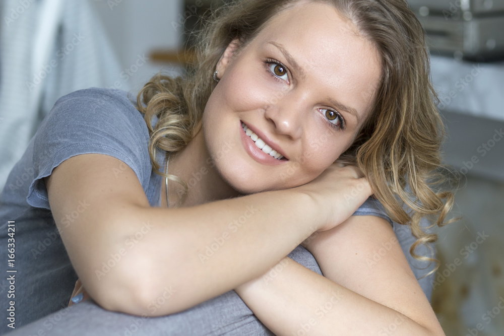Closeup of beutiful yound blonde woman. Smiling woman face Closeup of beutiful yound blonde woman. Smiling woman face
