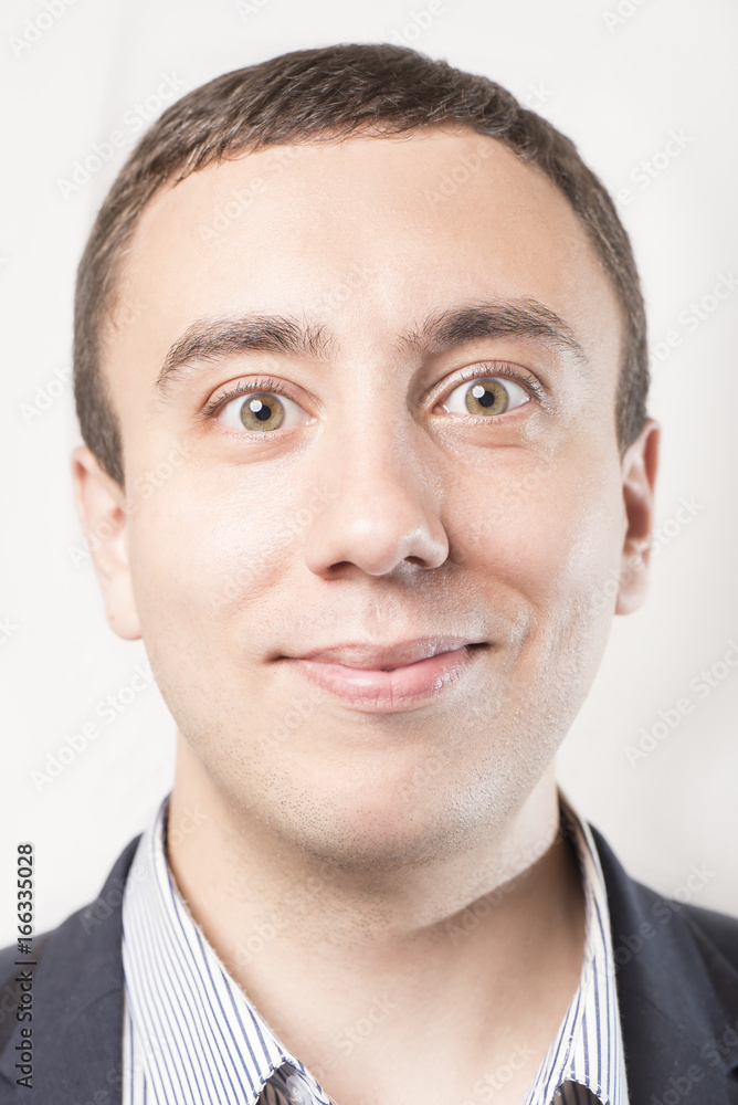 Portrait of a happy smiling businessman, isolated on a white background Portrait of a happy smiling businessman, isolated on a white background