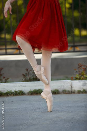 Ballet legs on the point outdoor.