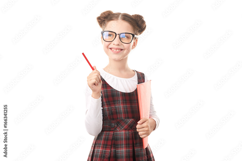 Portrait of girl wearing eyeglasses and school uniform standing against white background Portrait of girl wearing eyeglasses and school uniform standing against white background