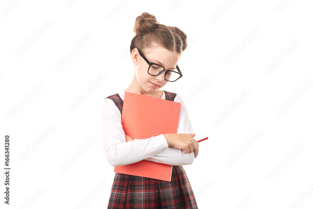 Portrait of girl wearing eyeglasses and school uniform standing against white background Portrait of girl wearing eyeglasses and school uniform standing against white background