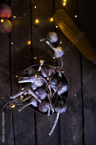 Still life of harvest of garlic and cabbage of corn. photo