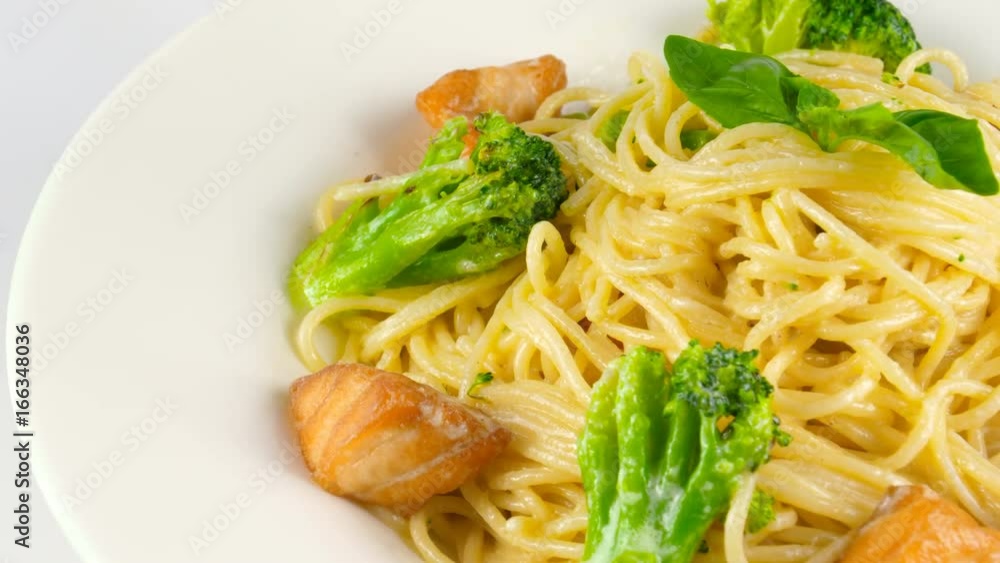 Tasty pasta with salmon and broccoli, loop, 4K, ProRes codec, 422 HQ, ISO 100 Tasty pasta with salmon and broccoli, loop, 4K, ProRes codec, 422 HQ, ISO 100