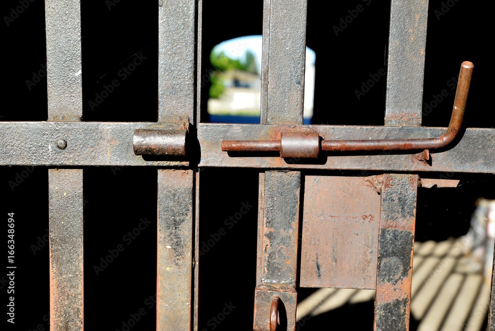 Steel grille with open bolt and exit view