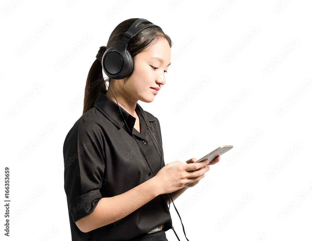 Portrait of a young business woman smiling with earbuds / headphone for listening to music or talking on smart phone. Isolated on white background with copy space Portrait of a young business woman smiling with earbuds / headphone for listening to music or talking on smart phone. Isolated on white background with copy space