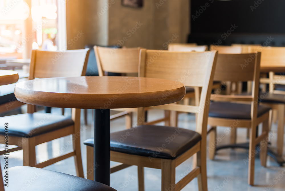 set of wooden round table and chair