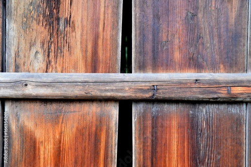 Obraz na płótnie Rural wooden door to the barn forming the background under the cool inscription w salonie