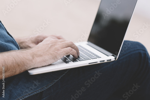 man with laptop photo