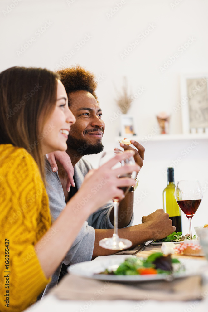 Group of friends having lunch at home. Group of friends having lunch at home.