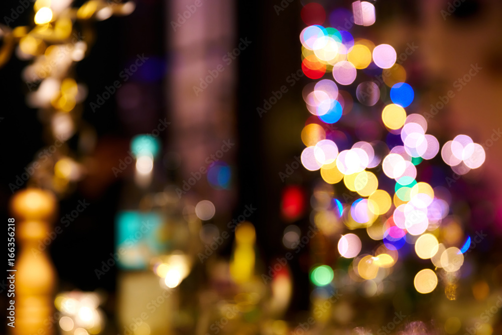 Unsharp Bokeh background during new years party with colorful lights Unsharp Bokeh background during new years party with colorful lights