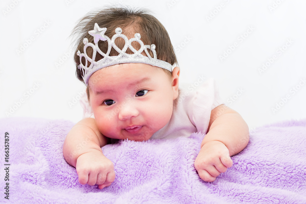 Portrait of sleeping baby lying on blanket with head band Portrait of sleeping baby lying on blanket with head band