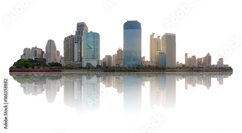 high modern building city nearby the park in central city at morning with water reflection.