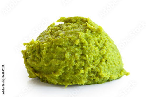 Photo Scoop of wasabi paste isolated on white.