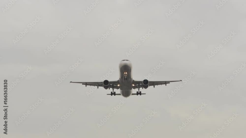 Airplane sits on the landing in cloudy weather. Airplane sits on the landing in cloudy weather.