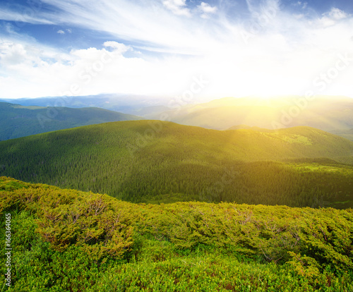 Mountain landscape on sun