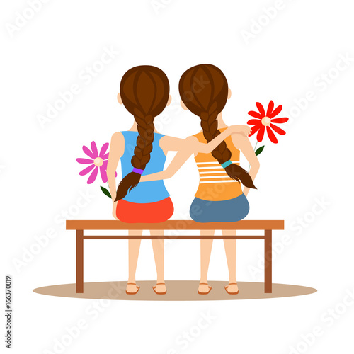 Back view of two cute girls hugging together on white isolated. Happy Friendship Day