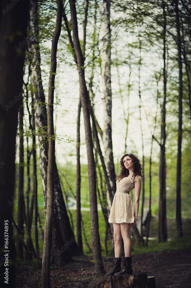 A girl is walking in the park A girl is walking in the park