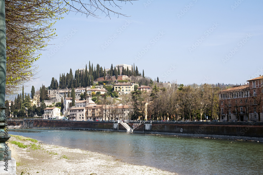 View of the San Pietro hill with the castle on the top and the Adige river, Verona, Italy