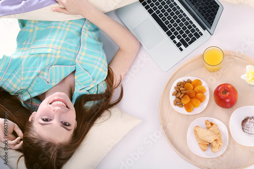 Young beautiful woman havin...