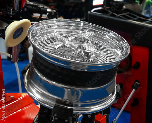 Wheel rim repair equipment presented in store, closeup photo