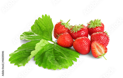 Ripe strawberries and leaves on white background