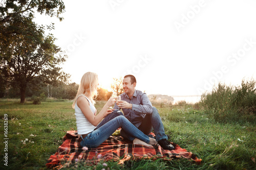 Couple in love at a picnic park © ViDi Studio