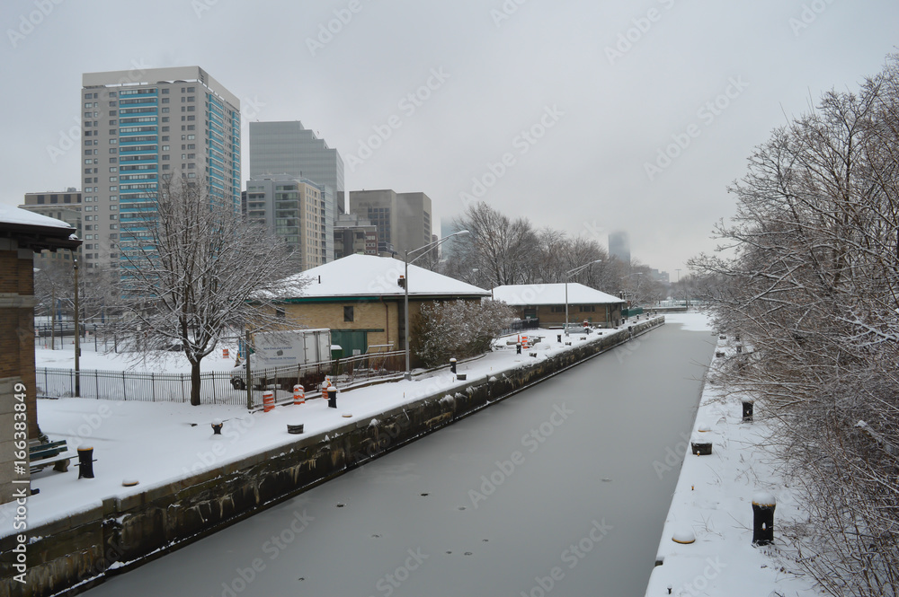 BOSTON, USA - DECEMBER 11: Snowy canal after winter storm in Boston, USA on December 11, 2016.