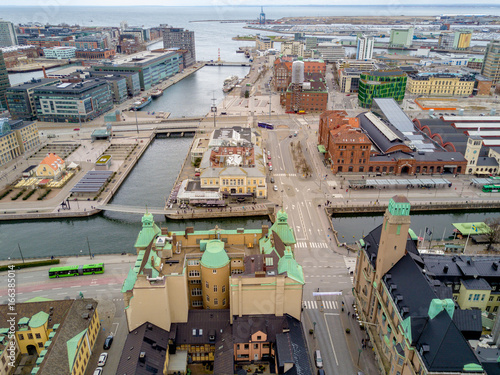 Photography Aerial Malmo city view from above with harbour, turning Torso and the bridge on