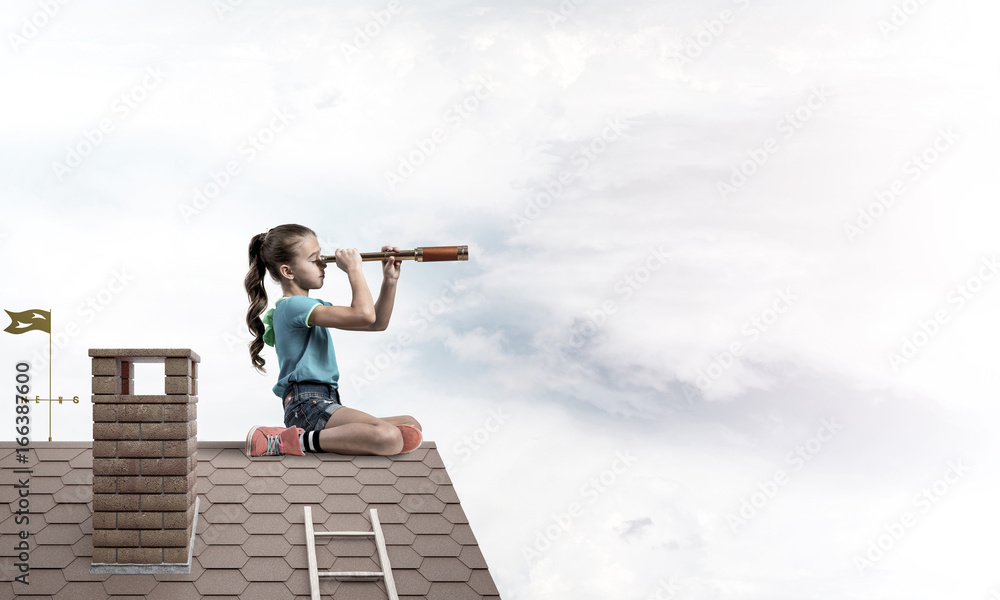 Concept of careless happy childhood with girl looking in spyglas Concept of careless happy childhood with girl looking in spyglas
