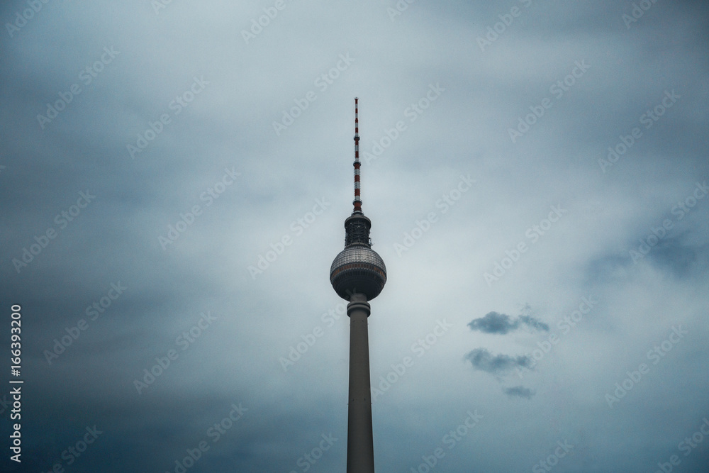 Berlin TelevisionTower Against Moody Blue Sky Berlin TelevisionTower Against Moody Blue Sky