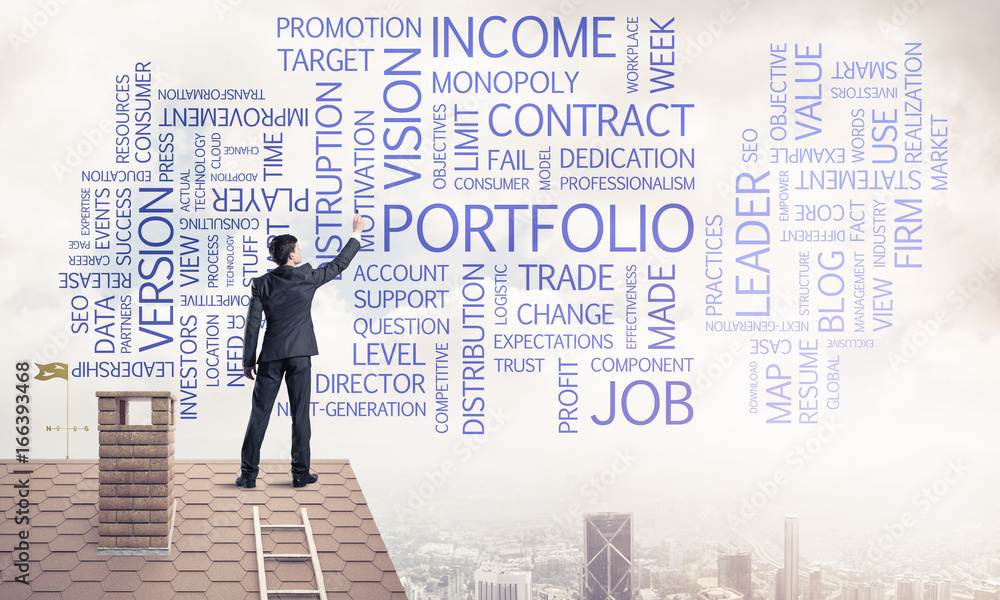 Young businessman standing on house roof and writing leadership Young businessman standing on house roof and writing leadership