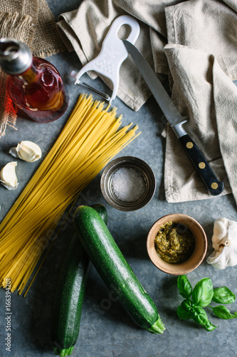 Courgette spaghetti ingredients on metal table. photo