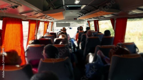 Transport, transfer and tourism. Tourists passengers people are traveling by bus on the road