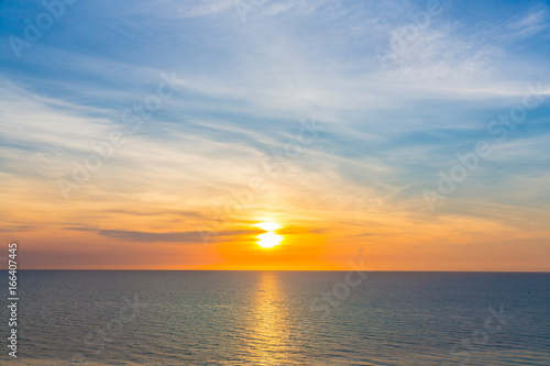 Sea or ocean with sunset and beautiful twilight color sky at Hua hin Thailand, Concept of calm or relaxation © Danai