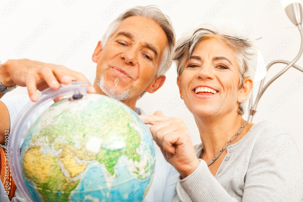 Senior Couple Planning A World Tour Senior Couple Planning A World Tour