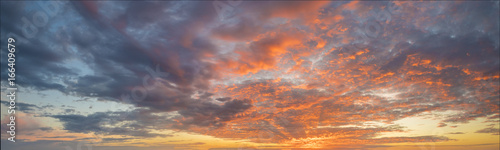 Fotografie, Tablou Fiery sunset, colorful clouds in the sky
