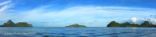 Panoramic view of tropical paradise sea and mountain range with beautiful blue sky at Manao bay , Prachuap Khiri Khan , Thailand.