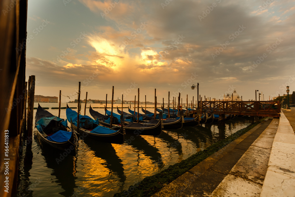 Gondolas of Venice in the morning light. Italy.