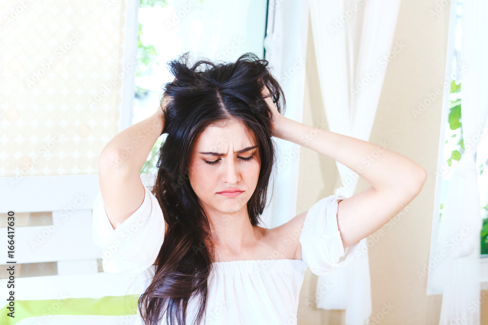 Woman stretching in bed after wake up