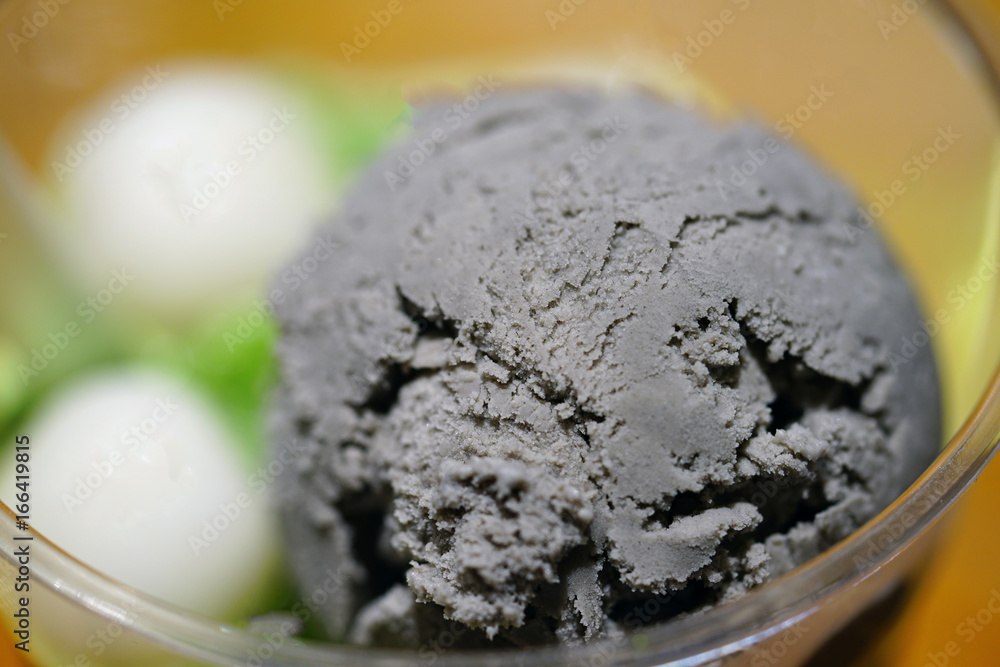 Scoop of black sesame ice-cream Scoop of black sesame ice-cream