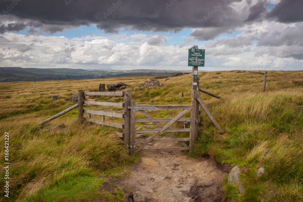Blackstone Edge is a gritstone escarpment at 1,549 feet above sea level in the Pennine hills surrounded by moorland on the boundary between Greater Manchester and West Yorkshire in England.