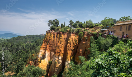 Panoramic view of red ocher cliffs around village of Roussillon, Provence, France photo