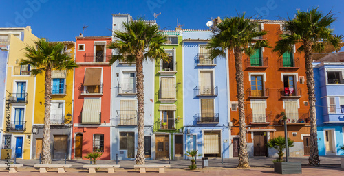 Panorama of colorful houses and palm trees in Villajoyosa