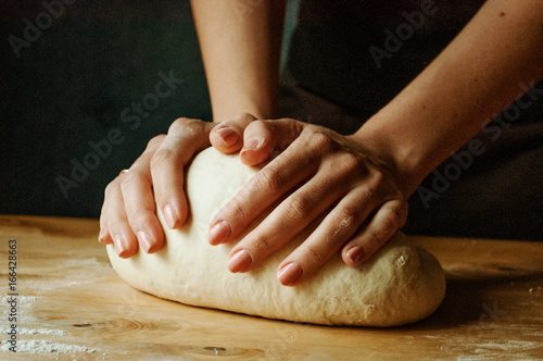 Hand kneading the dough