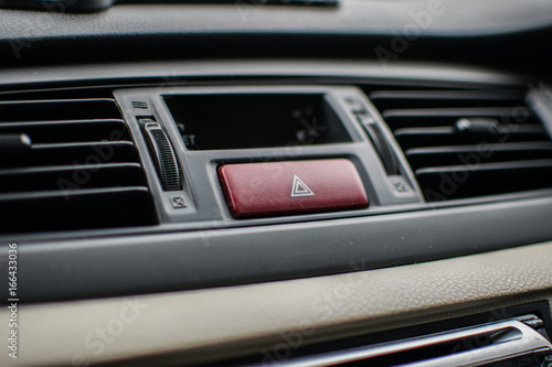 Emergency light button in car