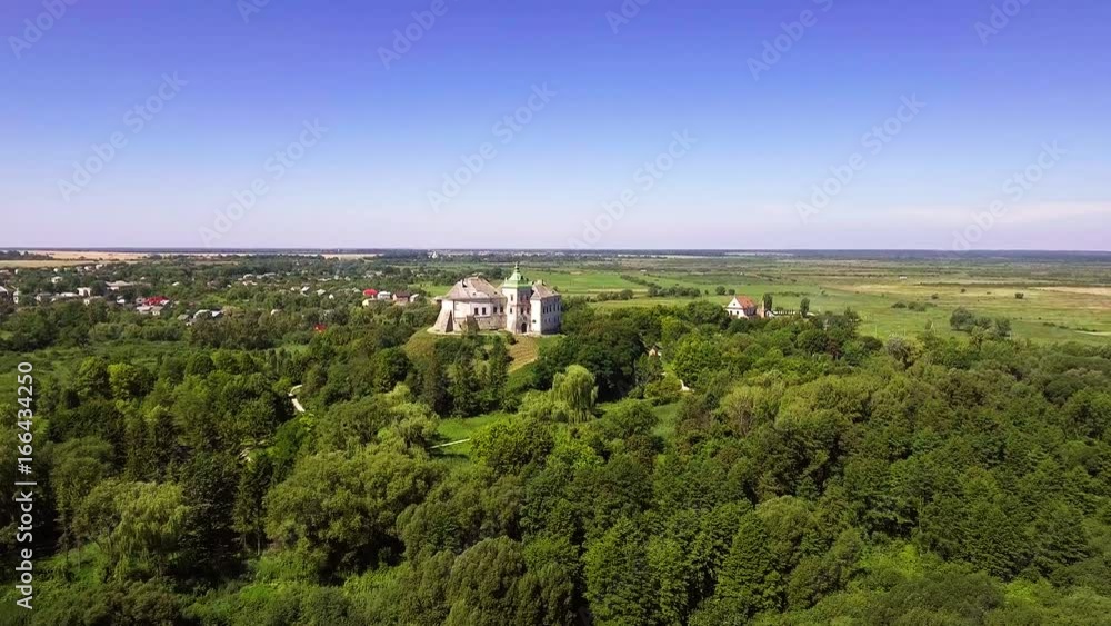 Aerial view of the Olesky Castle and residential neighborhoods near it Aerial view of the Olesky Castle and residential neighborhoods near it